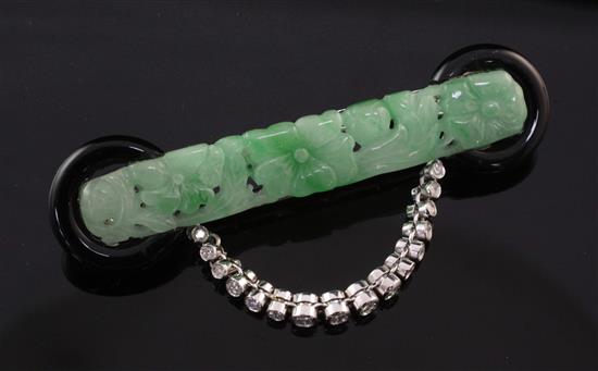 A white gold, jadeite, black onyx and diamond set bar brooch, 2.75in.